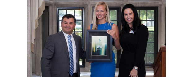 2014 Rising Star winner Laura Wittig is flanked by CDN Editor Paolo Del Nibletto and Ingram Micro's VP of Marketing Jennifer Johnson